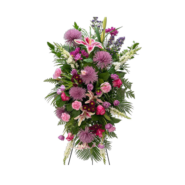 Gerbe funéraire en roses, tulipes, marguerites et lys, sur trépied